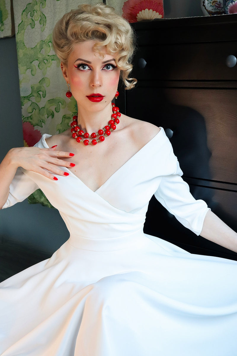 red dress and gold jewelry Red Dress Edit: Minimalist & Maximalist Jewelry for a Red Dress